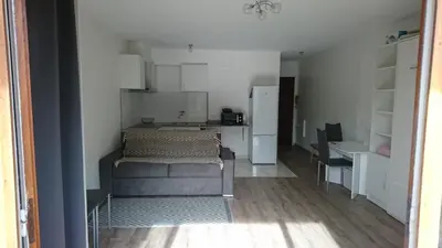 a room with a kitchen and a dining room at Cannes proche croisette in Cannes