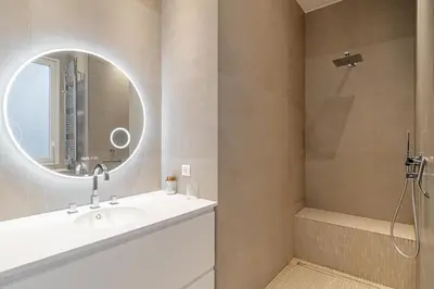a bathroom with a sink and a mirror at REF 1975 - Cannes Center - Croisette in Cannes