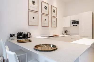 a kitchen with a counter with two plates on it at REF 1975 - Cannes Center - Croisette in Cannes