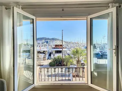 a large window with a view of a city at 3p Quai St Pierre - 348L Alexa in Cannes