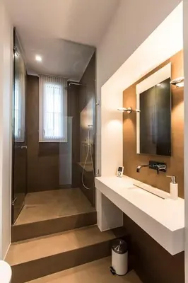 a bathroom with a shower and a sink at Cannes Croisette Loft vue mer in Cannes