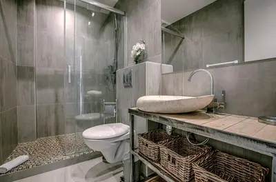 a bathroom with a toilet and a sink and a shower at Appartement Vaste Horizon - LRA Cannes in Cannes