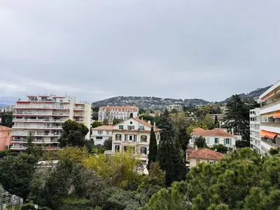 a view of a city with buildings and trees at Two bedroom apartment on a high floor in the center of Cannes a few steps from the Croisette beaches - 2229 in Cannes