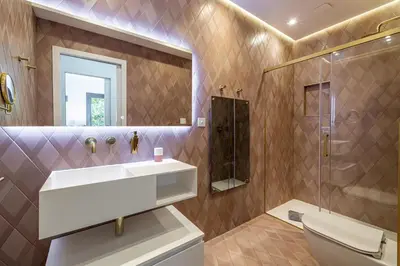 a bathroom with a sink and a shower at New! Villa de luxe centre Cannes in Cannes