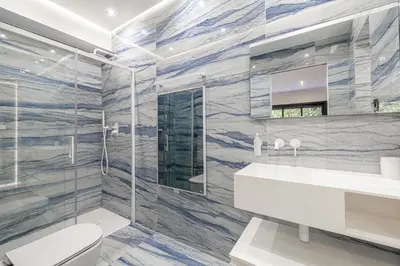 a bathroom with a white toilet and a sink at New! Villa de luxe centre Cannes in Cannes