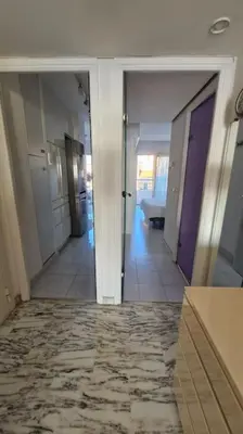 an empty hallway of a apartment with a hallway at Cannes SEASIDE BEACHFRONT bord de mer in Cannes