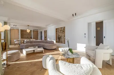 a living room with couches and chairs and a table at 1974 - Luxurious 3 bedrooms - Sea view & Parking in Cannes
