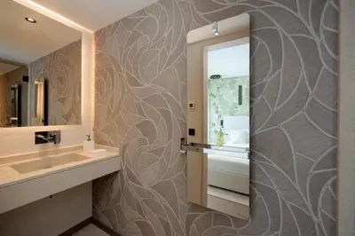 a bathroom with a sink and a mirror at 1973 - Luxurious waterfront apartment Croisette in Cannes