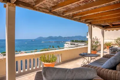 a balcony with a view of the ocean at Cannes - Roof terrace for rent in Cannes