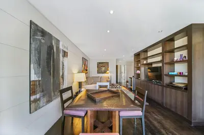 a dining room with a wooden table and chairs at REF 1319 - Cannes Center - Apartment for rent in Cannes