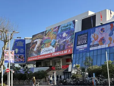 a building with many signs on the side of it at 9A - APARTMENT FACING PORT & Town Hall in Cannes