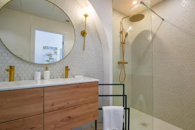 a bathroom with a sink and a mirror at 4A - APARTMENT FACING PORT & Town Hall in Cannes