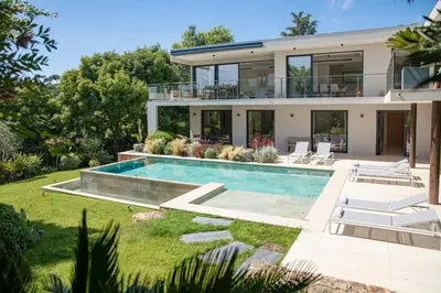 an image of a house with a swimming pool at REF 2152 - Le Cannet - Sea view villa for rent in Le Cannet