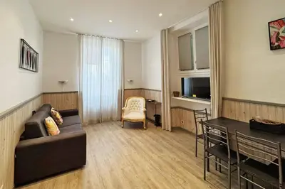a living room with a couch and a table at REF 1971- Apartment for rent basse Californie in Cannes