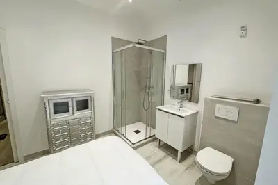 a bathroom with a shower and a toilet and a sink at REF 1971- Apartment for rent basse Californie in Cannes