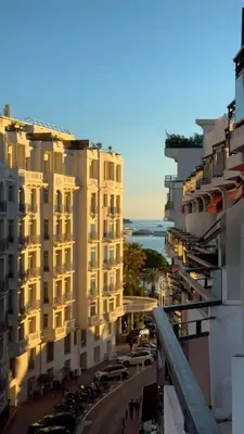 a view of a building from a balcony at Prestige Maubourg & Exclusive Sea View Terrace in Cannes