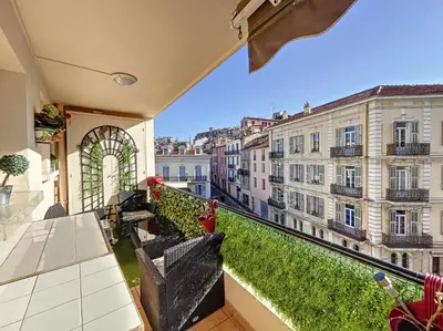 a balcony with a view of a building at A 2 pas des plages et centre 324L TER in Cannes