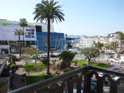 a view of a city from a balcony at Arthur Properties Croisette in Cannes