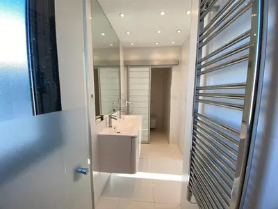 a bathroom with a sink and a mirror at C010 - Magnifique Appartement Toit Terrasse in Cannes