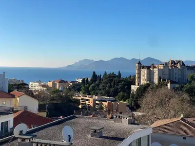 a view of the ocean from the roof of a building at C010 - Magnifique Appartement Toit Terrasse in Cannes