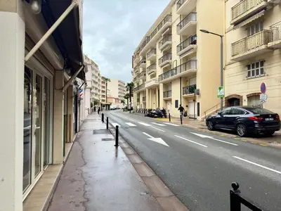 an empty city street with buildings and a car at Haute-Rive By SCLS Locations in Cannes