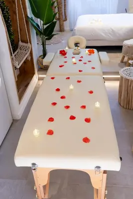 a white table with hearts on it in a room at La Suite Jardin Secret in Cannes