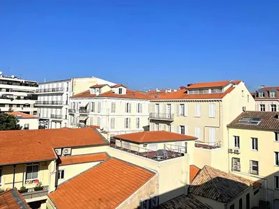 a group of buildings with red roofs at Sunny 1 Bedroom Rue Commandant André in Cannes