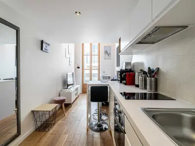 a kitchen with a sink and a counter at Bright duplex-Cannes Centre -Mobility lease in Cannes