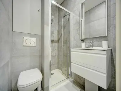 a bathroom with a shower and a toilet and a sink at Cosy flat in Cannes - Mobility lease in Cannes