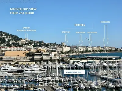 a bunch of boats docked in a marina at Bela Vista By SCLS Locations in Cannes
