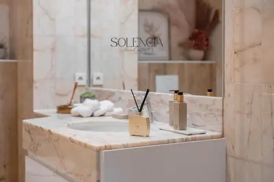 a bathroom counter with a sink and a mirror at 2 pièces rue d'Antibes - Climatisation in Cannes