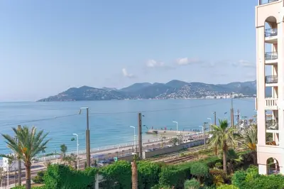 a view of the ocean from a building at L'AZUR avec terrasse vue mer, piscine accessible et près des plages in Cannes