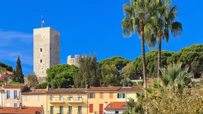 a view of a town with a tower at Residence Aout 21 in Cannes