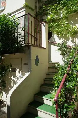 a set of stairs leading up to a building at ALC - A523 - 4 min Palais and Beaches in Cannes