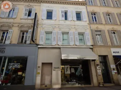 a building on a city street with a store at ALC - A523 - 4 min Palais and Beaches in Cannes