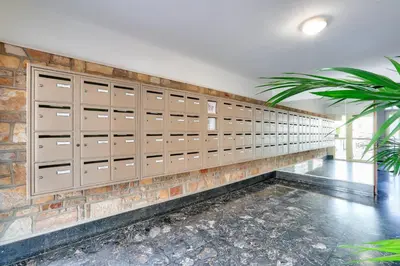 a row of lockers on a brick wall at Le Petit Fleury – Balcony, Calm in Cannes in Cannes
