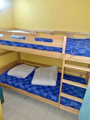 two bunk beds in a room with a ladder at Cannes, La Palme d'Or in Cannes