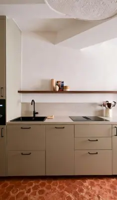 a kitchen with a sink and a counter top at Exceptional facing Palais Cannes 3 in Cannes