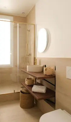 a bathroom with a sink and a shower at Exceptional facing Palais Cannes1 in Cannes