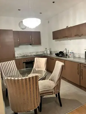 a living room with a couch and a glass table at 3P Cannes Centre 2min Palais des Festivals,Rue du Antibe location in Cannes