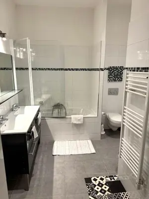 a bathroom with a tub and a sink and a toilet at 3P Cannes Centre 2min Palais des Festivals,Rue du Antibe location in Cannes