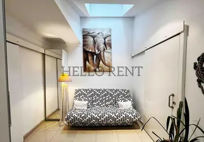 a room with a picture of an elephant on the wall at Grande Villa Cannes Centre havre de paix in Cannes