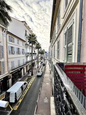 a city street with cars parked on the street at Cannes 2 Bedroom Apartment - 19JDR2 in Cannes