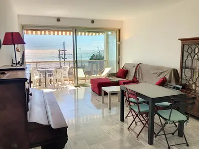 a living room with a view of the ocean at Bord de mer, terrasse vue mer 228L in Cannes