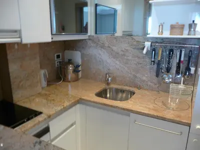 a kitchen with a sink and a counter top at Residence Palais Miramar in Cannes