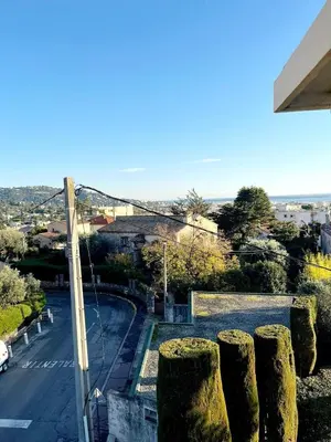 a view from the balcony of a house at 3 pièces cocon dans les hauteurs de Cannes vue mer in Le Cannet