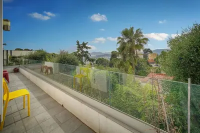 a balcony with a view of a city at FRGK 