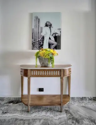 a table with a vase of flowers on top of it at Cannes 1 bedroom apartment - M6 in Cannes