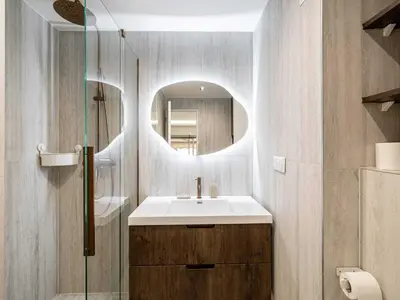 a bathroom with a sink and a mirror at Elegant Apt with balcony 1BD 4P - Croisette Cannes in Cannes