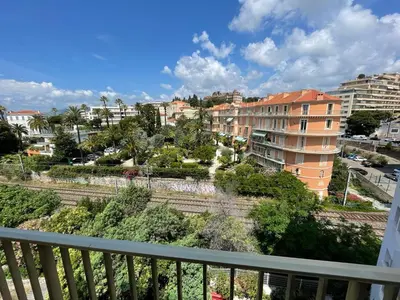a view of a city from a balcony at Mistral Seaside Studio - 200m de la Plage in Cannes